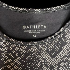 Athleta xs crop workout top. Black with silver detail. Never worn. Thick Lycra.